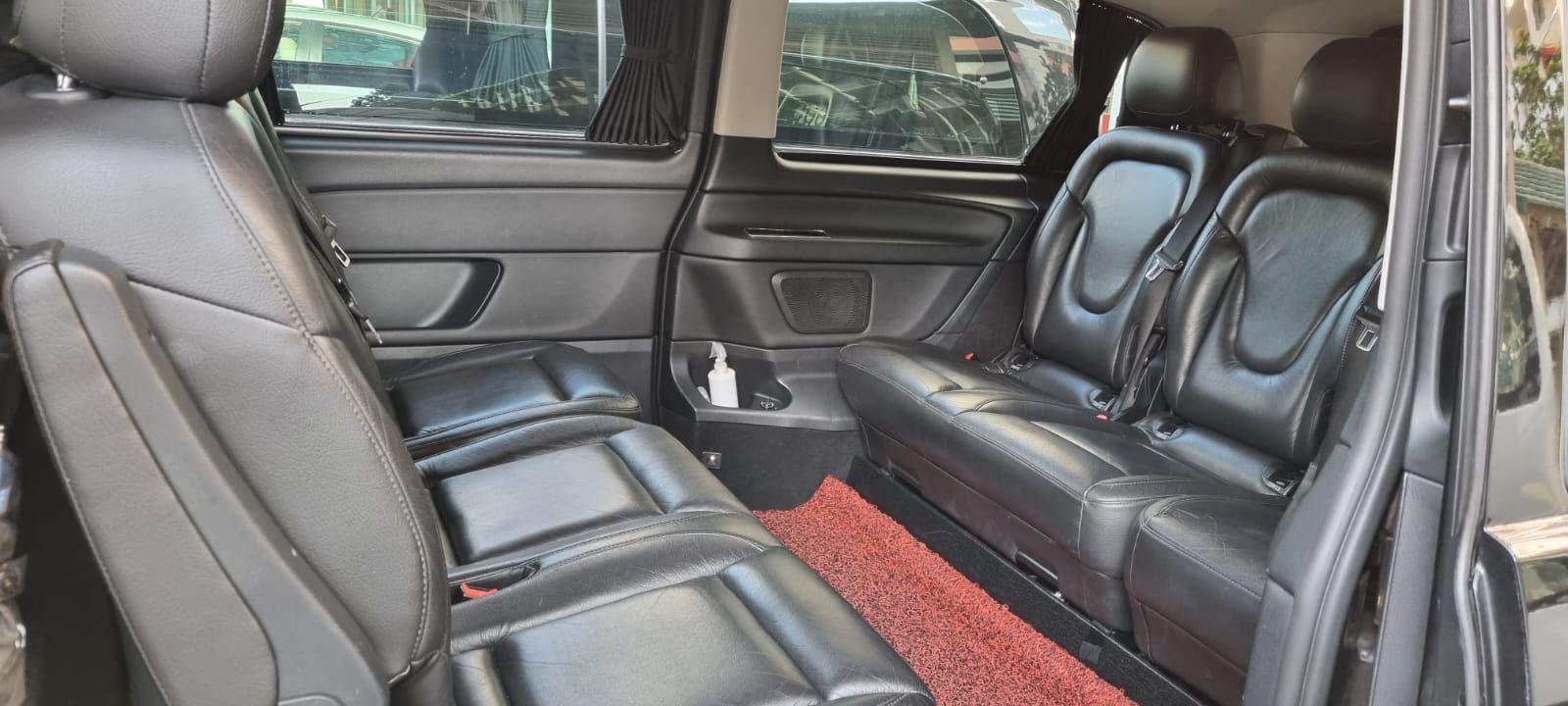 Classic MaxiCab leather seating for group transfers