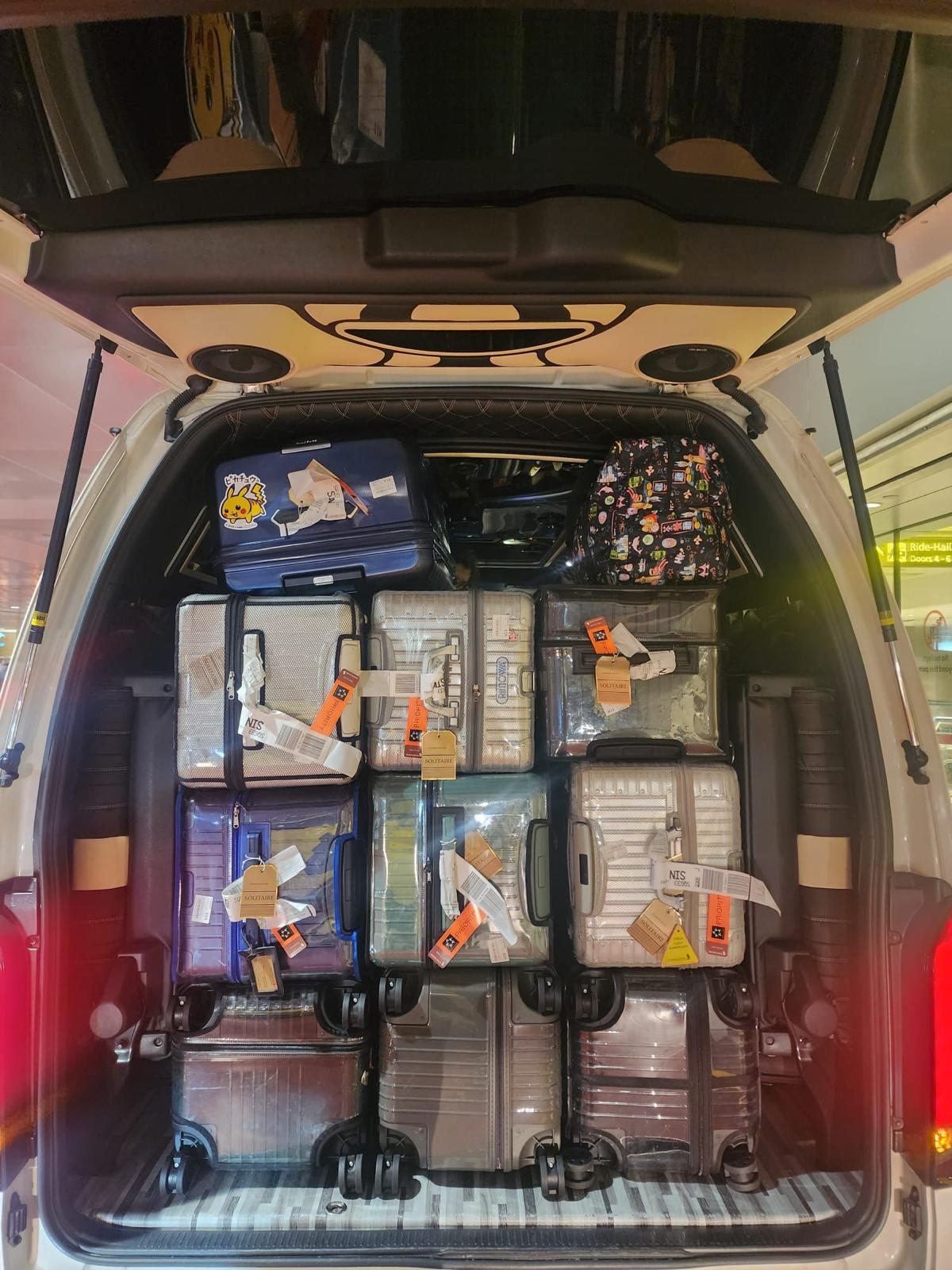 Spacious luggage compartment loaded with suitcases