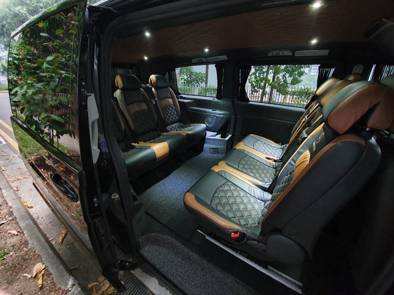 Premium MaxiCab interior with tan leather diamond-stitched seats